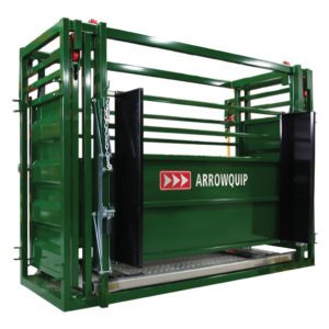 A green cattle crate with two gates open.
